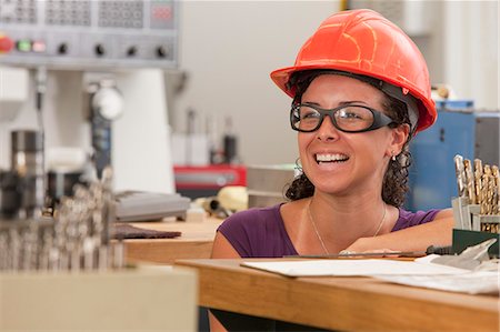 drill bit - Engineering student studying in a machine lab Stock Photo - Premium Royalty-Free, Code: 6105-05396357