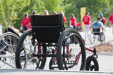 sports and cycling racing - Wheelchair at the finish line of a bike race Stock Photo - Premium Royalty-Free, Code: 6105-05396309