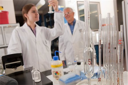 simsearch:6105-05396454,k - Scientists examining in the laboratory of water treatment plant Stock Photo - Premium Royalty-Free, Code: 6105-05396448