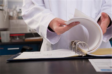 documento - Scientist preparing a report in the laboratory of water treatment plant Foto de stock - Sin royalties Premium, Código: 6105-05396479