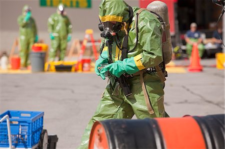 fire safety - HazMat firefighter working with a camera Stock Photo - Premium Royalty-Free, Code: 6105-05396512