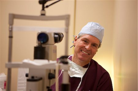 Ophthalmologist with a Laser machine Stock Photo - Premium Royalty-Free, Code: 6105-05396702