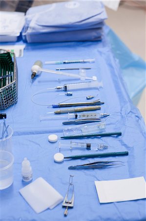 Surgical equipment on table in an operating room Stock Photo - Premium Royalty-Free, Code: 6105-05396710