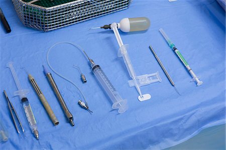 preparing and sandwich - Specific medical instruments for cataract surgery on a table Stock Photo - Premium Royalty-Free, Code: 6105-05396711