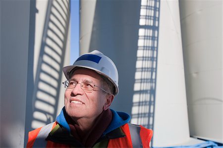 simsearch:6105-05396876,k - Engineer in front of storage silos Stock Photo - Premium Royalty-Free, Code: 6105-05396851