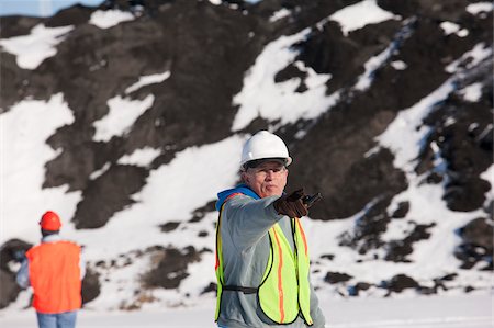 simsearch:6105-05396876,k - Engineer directing at a construction site in winter Stock Photo - Premium Royalty-Free, Code: 6105-05396896