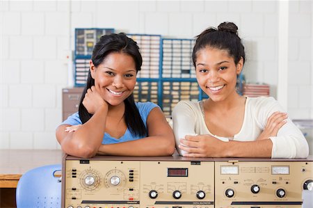 Engineering students using bench test equipment in a lab Stock Photo - Premium Royalty-Free, Code: 6105-05953753