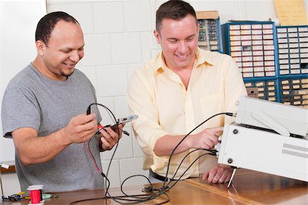 electricity man cable - Engineering students using oscilloscope and function generator Stock Photo - Premium Royalty-Free, Code: 6105-05953750