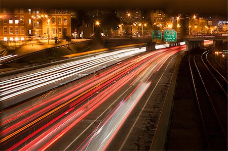 simsearch:6105-05396336,k - Streaks of lights of moving vehicles on the road, Mass Turnpike, Boston, Massachusetts, USA Foto de stock - Sin royalties Premium, Código: 6105-05953778