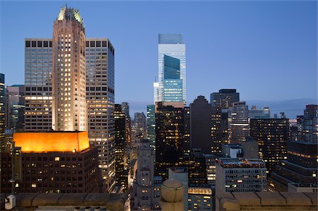 exterior office buildings - Buildings lit up at dusk downtown Manhattan looking north, New York City, New York State, USA Foto de stock - Sin royalties Premium, Código: 6105-05953779