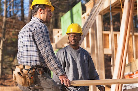 simsearch:614-06895837,k - Carpenters moving a rafter Stock Photo - Premium Royalty-Free, Code: 6105-06702834