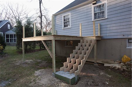 Stair stringers installed on new deck without treads Stock Photo - Premium Royalty-Free, Code: 6105-06702928