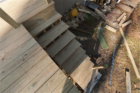 Deck stairway construction at homesite Stock Photo - Premium Royalty-Free, Code: 6105-06702929
