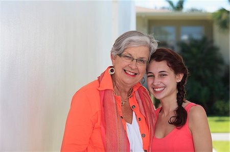 simsearch:6105-05397132,k - Senior woman smiling with her granddaughter Stock Photo - Premium Royalty-Free, Code: 6105-07521355