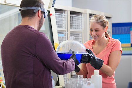 Engineering students looking at Desiccator in a chemical laboratory Stock Photo - Premium Royalty-Free, Code: 6105-07521370