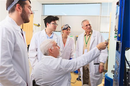 Professors explaining operation of water ultra purification system to engineering students in a laboratory Stock Photo - Premium Royalty-Free, Code: 6105-07521383
