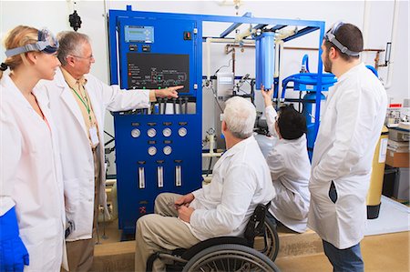 professor with student - Professors explaining operation of water ultra purification system and submicron filters to engineering students in a laboratory Stock Photo - Premium Royalty-Free, Code: 6105-07521382