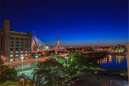 City lit up at dusk, Leonard P. Zakim Bunker Hill Bridge, North End, Boston, Massachusetts, USA Stock Photo - Premium Royalty-Free, Code: 6105-07521433