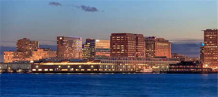 Seaport District with World Trade Center at dusk, Boston, Massachusetts, USA Foto de stock - Royalty Free Premium, Número: 6105-07744418