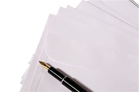 empty tabletop - Close-up of envelopes and a pen Stock Photo - Premium Royalty-Free, Code: 6107-06117447
