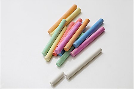 Colorful chalks on white background Fotografie stock - Premium Royalty-Free, Codice: 6107-06117458