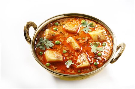 Gros plan d'aloo matar paneer Photographie de stock - Premium Libres de Droits, Code: 6107-06117413