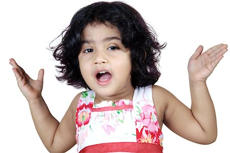 surprised people white background - Portrait of a girl looking curiously Stock Photo - Premium Royalty-Free, Code: 6107-06117583