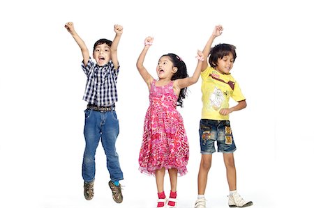 Portrait of three children dancing Foto de stock - Sin royalties Premium, Código: 6107-06117773