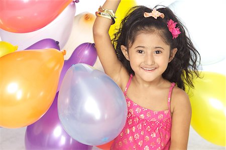 escuela de danza - Girl Playing with balloons Foto de stock - Sin royalties Premium, Código: 6107-06117856