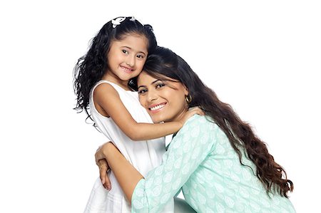 Portrait of mother and daughter smiling Foto de stock - Sin royalties Premium, Código: 6107-06117867