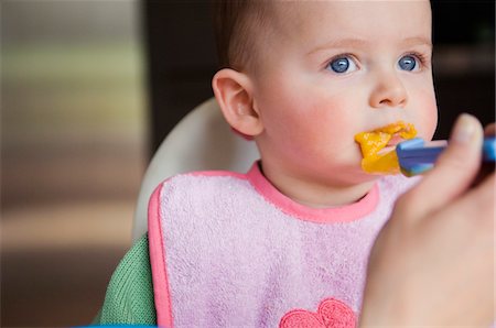 simsearch:877-07460636,k - Mother feeding her Baby, close up Stock Photo - Premium Royalty-Free, Code: 6108-05855996