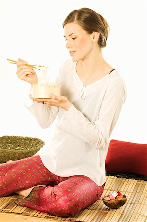 Woman eating chinese pasta Foto de stock - Sin royalties Premium, Código: 6108-05855935