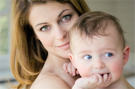 shoulders mom - Portrait of mother and baby Stock Photo - Premium Royalty-Free, Code: 6108-05856004