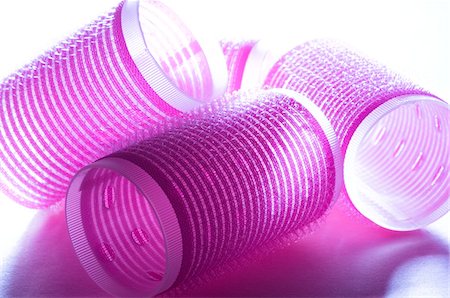 Pink hair curlers, close-up Stock Photo - Premium Royalty-Free, Code: 6108-05857182