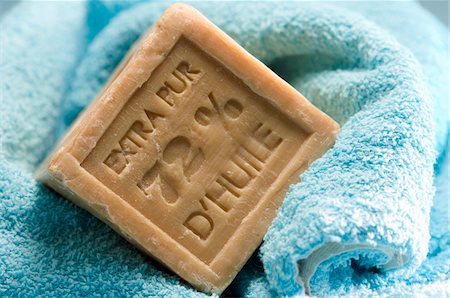 Soap on a towel, close-up Stock Photo - Premium Royalty-Free, Code: 6108-05857241