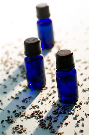 3 essential oil bottles, close-up Stock Photo - Premium Royalty-Free, Code: 6108-05857269