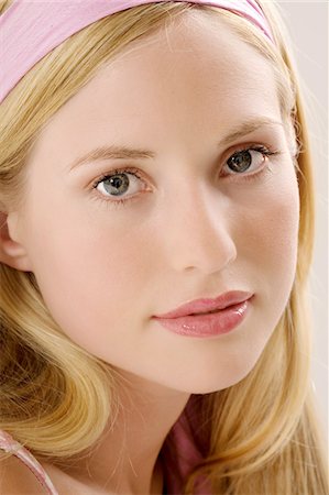 dance studio - Portrait of a maked young woman, looking at the camera, indoors (studio) Stock Photo - Premium Royalty-Free, Code: 6108-05857324