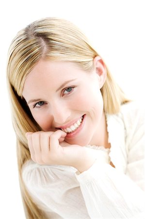 simsearch:6108-05857342,k - Portrait of a young woman looking at the camera, indoors (studio) Foto de stock - Sin royalties Premium, Código: 6108-05857339