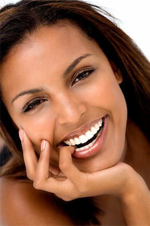 Portrait d'une jeune femme, sourire pour la caméra Photographie de stock - Premium Libres de Droits, Code: 6108-05857436