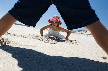 simsearch:6108-05858089,k - Two children playing on the beach, outdoors Stock Photo - Premium Royalty-Free, Code: 6108-05858144