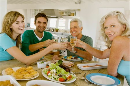 simsearch:6108-05858214,k - Family at home Stock Photo - Premium Royalty-Free, Code: 6108-05858246