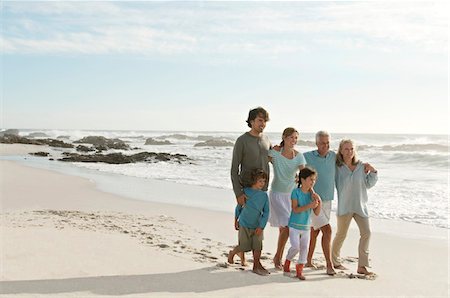 family walk sand - Family on the beach Stock Photo - Premium Royalty-Free, Code: 6108-05858226