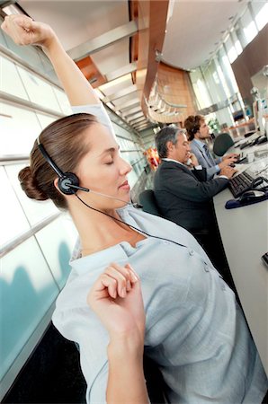 raising hand - Business colleague working in office Stock Photo - Premium Royalty-Free, Code: 6108-05859296