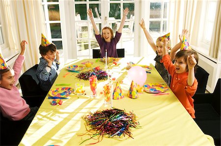 drapery table - Children celebrating a birthday party Stock Photo - Premium Royalty-Free, Code: 6108-05860677