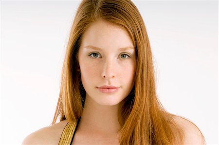 red headed female portrait - Portrait of a young woman Stock Photo - Premium Royalty-Free, Code: 6108-05860979