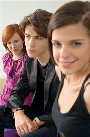 redhead teenage boy - Portrait of two young women with a teenage boy Stock Photo - Premium Royalty-Free, Code: 6108-05861189