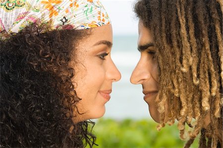 dreadlocks closeup - Affectionate couple looking at each other Stock Photo - Premium Royalty-Free, Code: 6108-05862049