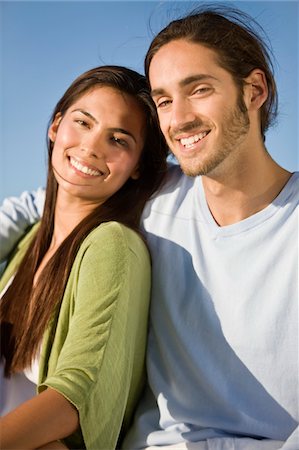 simsearch:6108-05860702,k - Portrait of a couple smiling Fotografie stock - Premium Royalty-Free, Codice: 6108-05862091