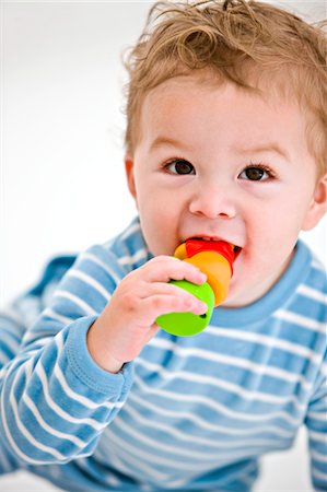 simsearch:6108-05863835,k - Baby boy playing with a toy Stock Photo - Premium Royalty-Free, Code: 6108-05863144