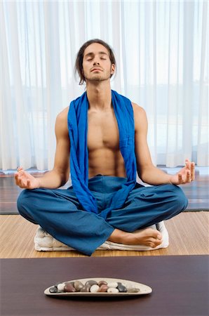 Man practicing yoga Fotografie stock - Premium Royalty-Free, Codice: 6108-05863502